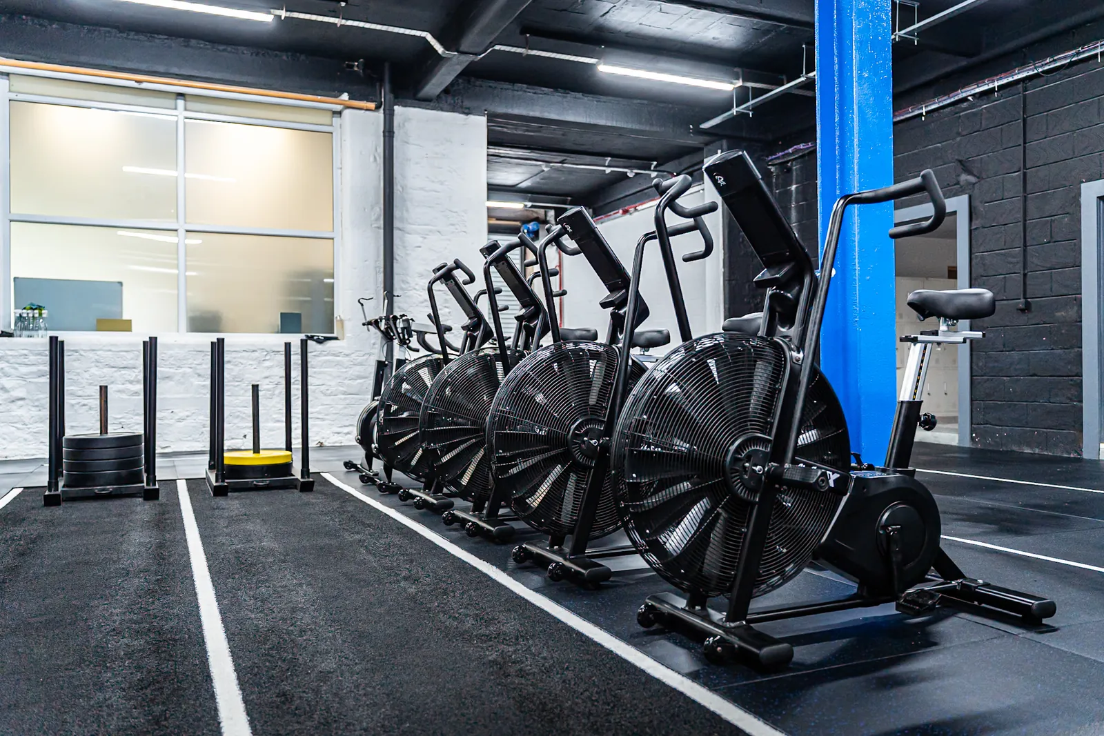 Row of indoor cycling and cardio bikes
